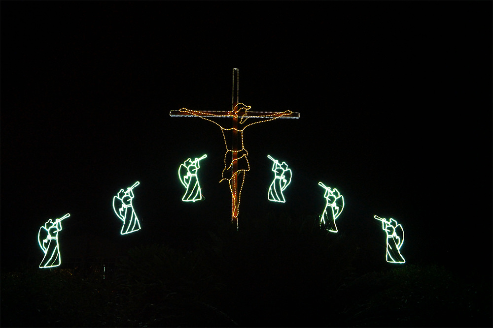 A light display featuring the crucified Jesus surrounded by angels blowing trumpets in Potchefstroom, South Africa